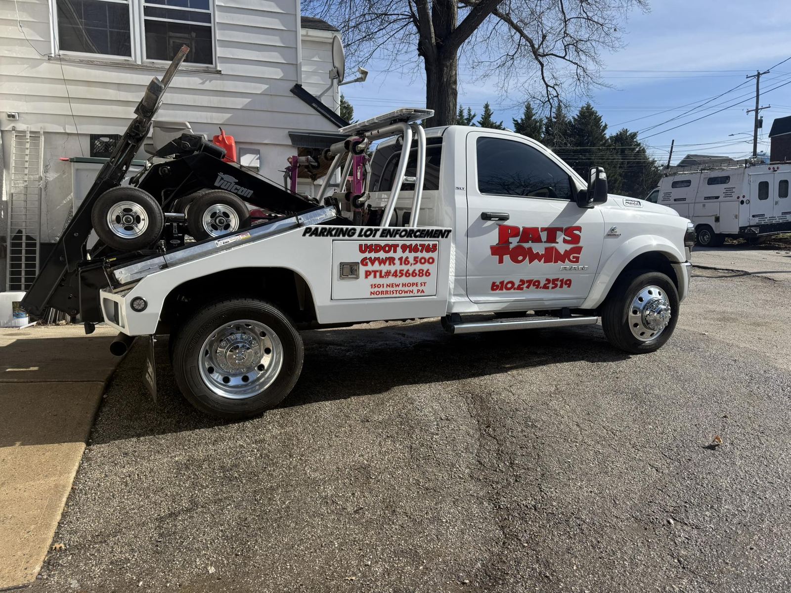 White Pat's Towing parking enforcement truck